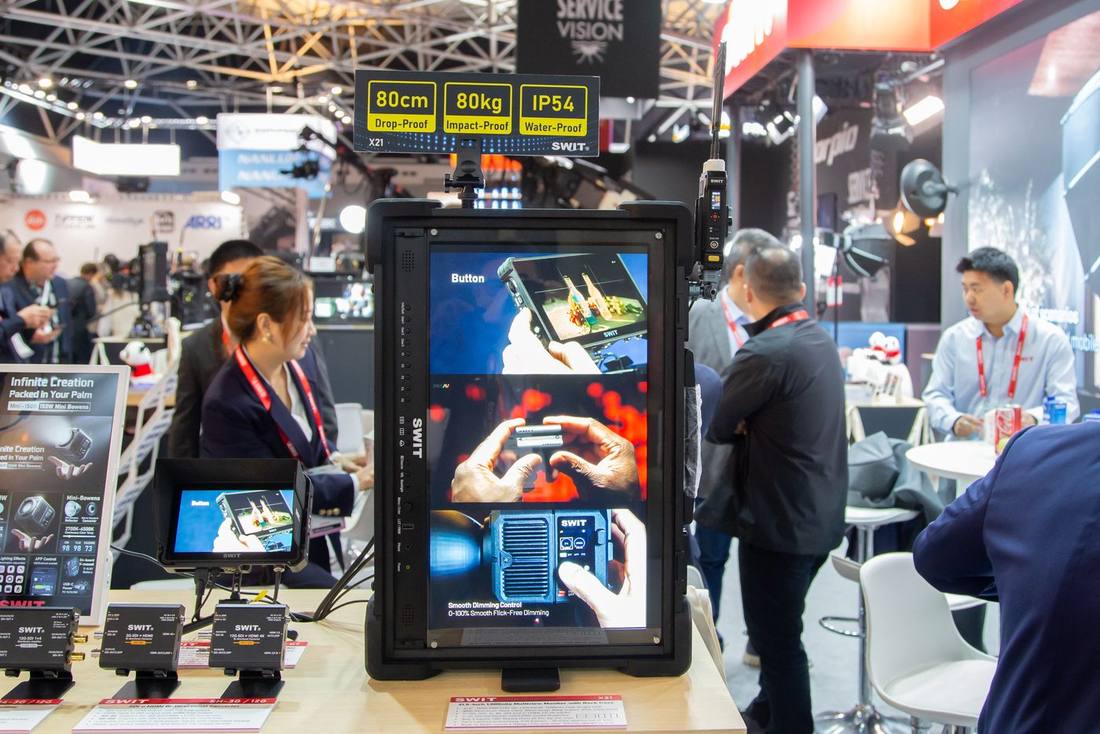SWIT X21 21.5-inch rugged field monitor with its 80cm drop-proof and IP54 rating banner at IBC2026